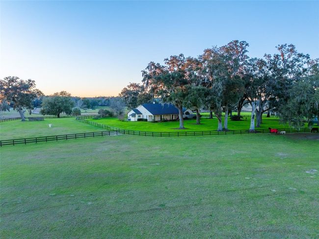 Sweeping views of the pastures are visible from every room in the house | Image 70