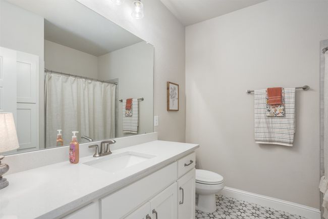 Large Secondary bathroom that is between the two bedrooms is spacious. | Image 22