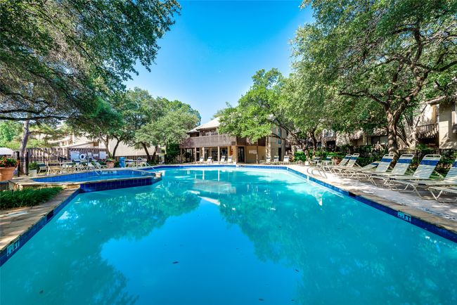 Community pool with a patio | Image 29