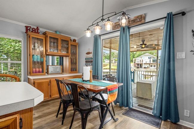 Kitchen with view of deck | Image 15