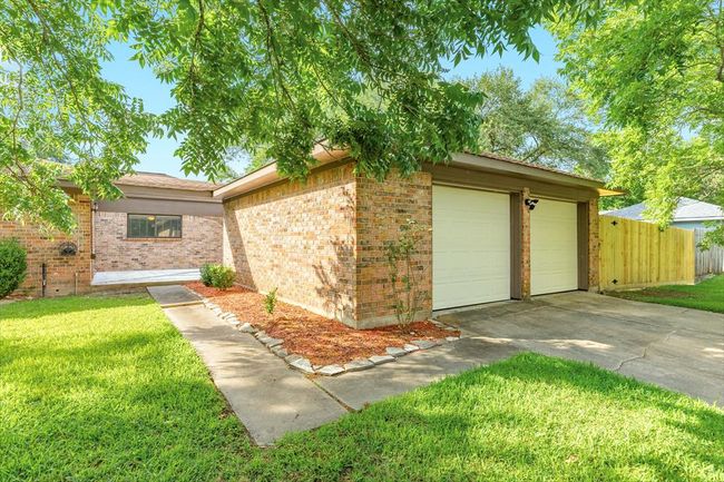Two car detached garage at the back of the home. | Image 36