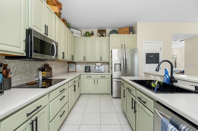 Kitchen Offers Pantry Closet. | Image 19