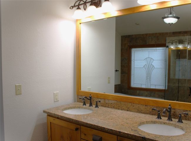 Full bathroom featuring double vanity | Image 16