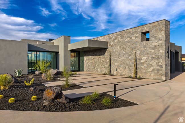 Rear view of house with stone siding and stucco siding | Image 16