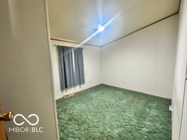 additional living space featuring visible vents and carpet floors | Image 17