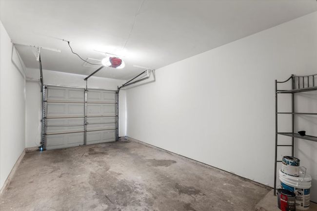 Private garage with with a garage door opener | Image 23