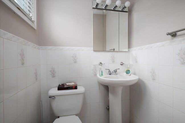 Bathroom featuring toilet | Image 12