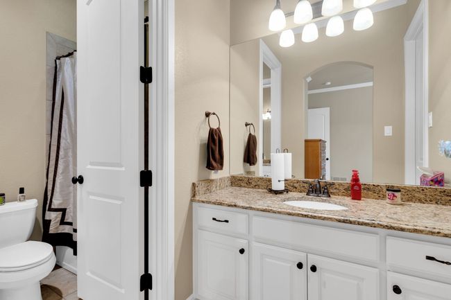 Bathroom with vanity and crown molding | Image 28