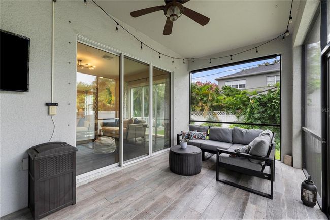 Spacious covered screen porch off great room | Image 49