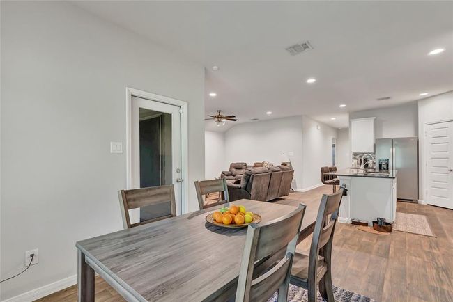 Another view of kitchen and living area from dining room....spacious | Image 27