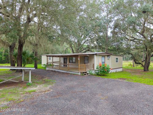 203 Pond Cir, Interlachen, FL, 32148-4133 | Card Image