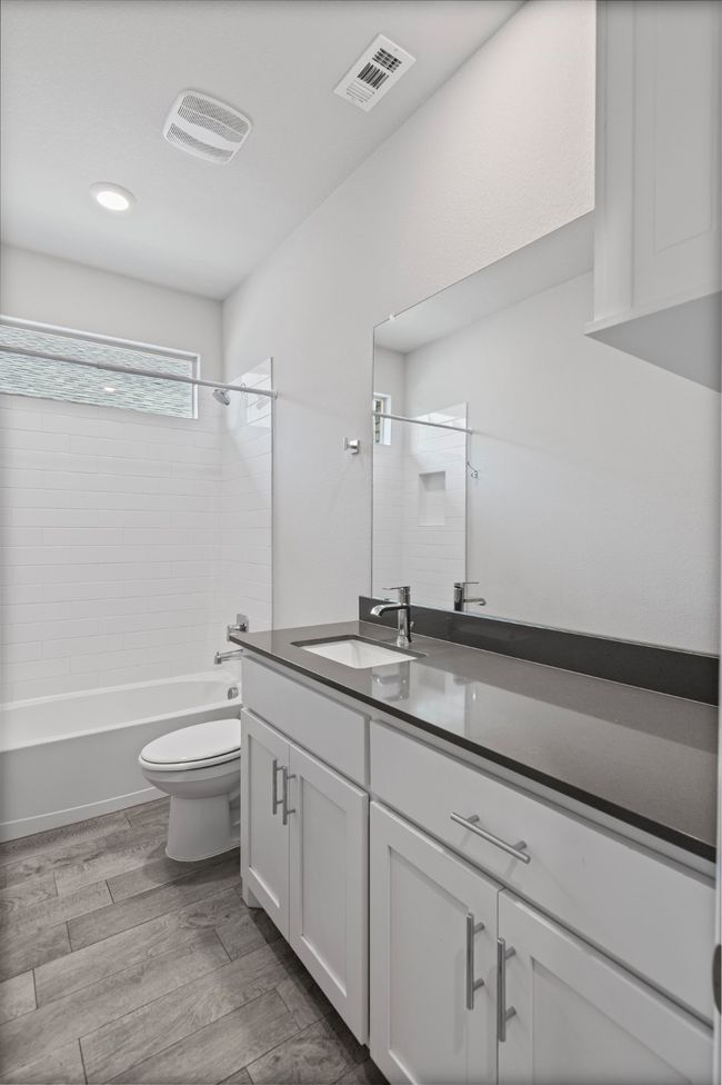 Full Bath Conveniently Located by the Secondary Bedrooms | Image 23