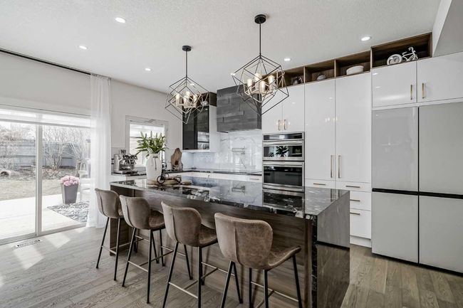 122 Rockywood Cir Nw, House other with 4 bedrooms, 4 bathrooms and 4 parking in Calgary AB | Image 15