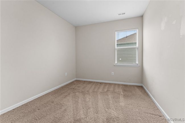 Spare room with carpet flooring and baseboards | Image 41