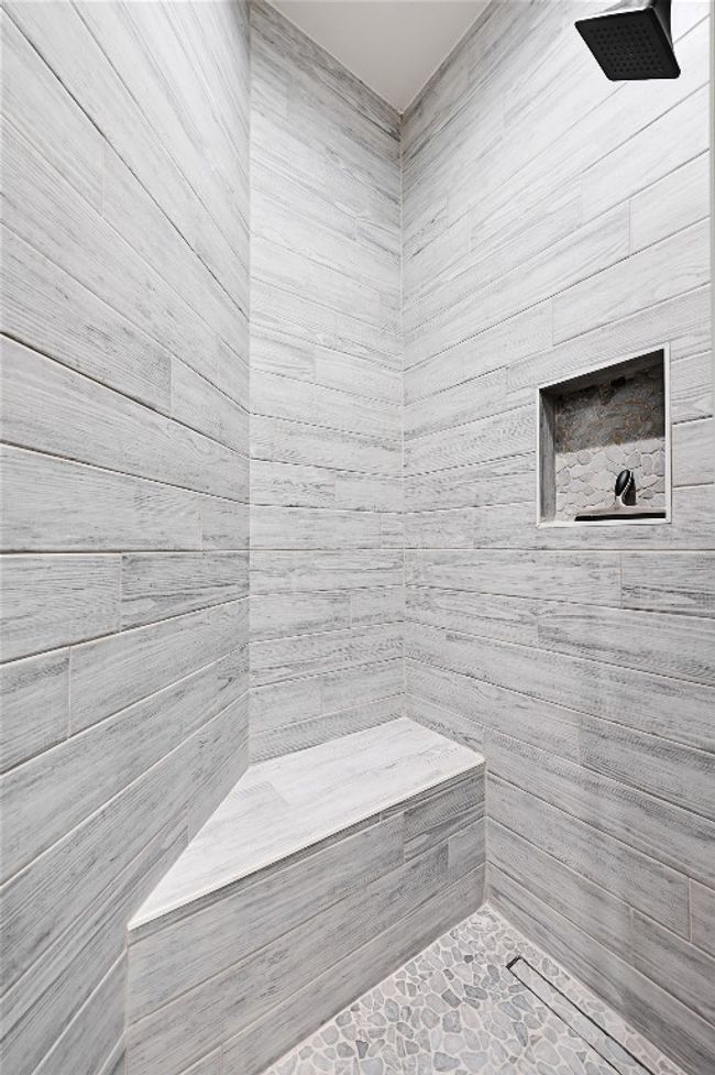 Bathroom featuring tiled shower and a sauna | Image 25