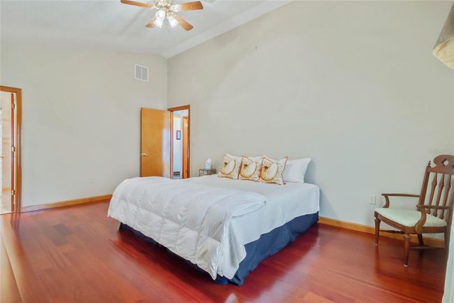 Primary Bedroom features Vaulted Ceilings | Image 16