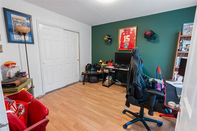 Fourth bedroom, currently being used as an office. Located downstairs. | Image 12
