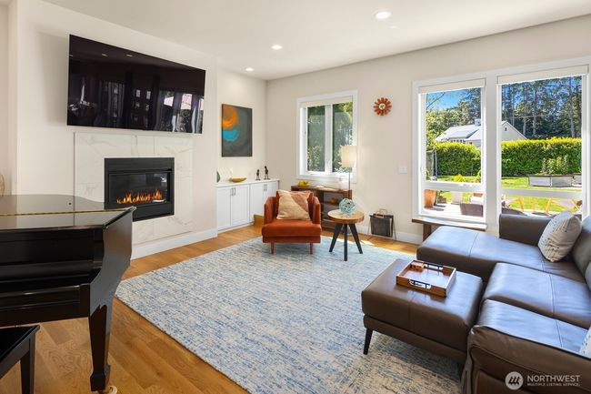 Flexible open space for living with a wall of windows to the private yard. | Image 5