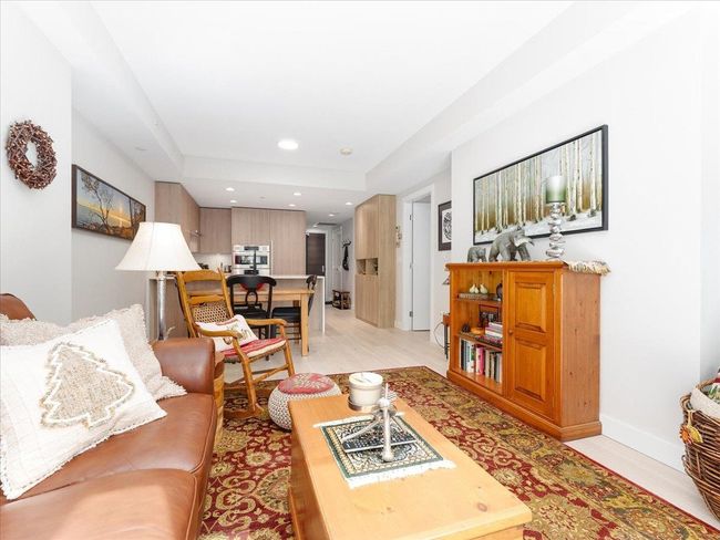 Living area featuring light wood finished floors | Image 6