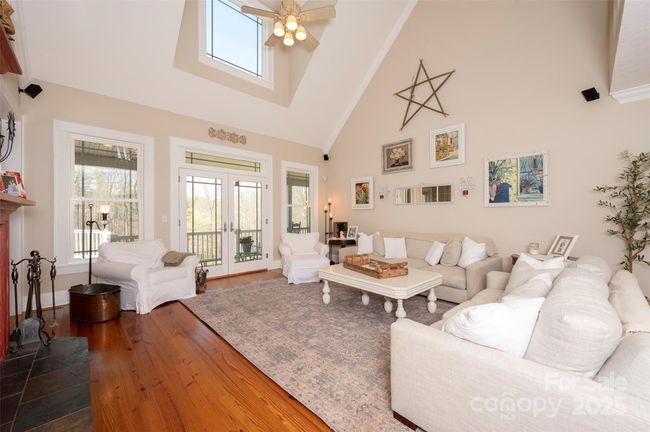 Two Story Great Room with Heart of Pine floors; Jeld-Wen windows | Image 7