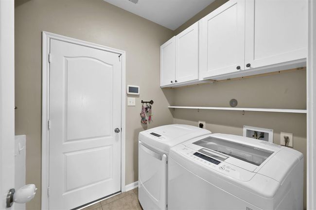 Large laundry room with additional storage to the left (not shown in photo) | Image 43