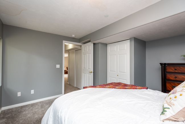 Carpeted bedroom featuring baseboards and a closet | Image 28