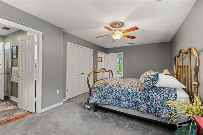 Bedroom with baseboards and a ceiling fan | Image 36