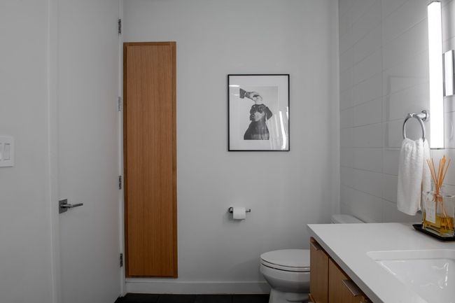 Bathroom with tile patterned flooring, toilet, and vanity | Image 25