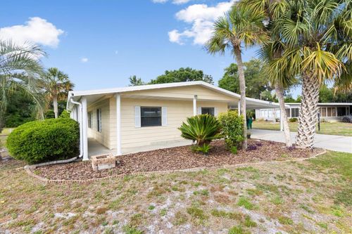 5556 Columbus Cir, WILDWOOD, FL, 34785-8120 | Card Image