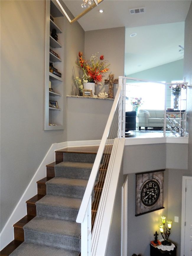 Staircase featuring recessed lighting and lofted ceiling | Image 18