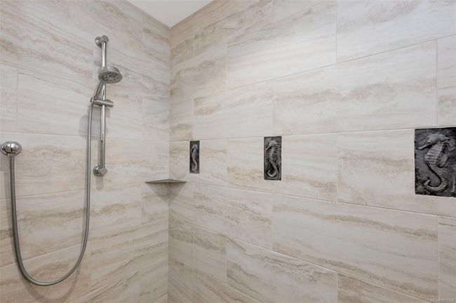 Bathroom featuring tiled shower | Image 57