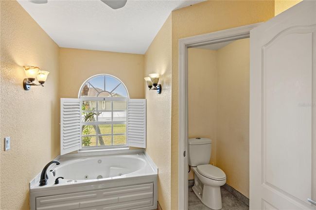 12950 Sw Pembroke Cir S, House other with 3 bedrooms, 2 bathrooms and null parking in LAKE SUZY FL | Image 21