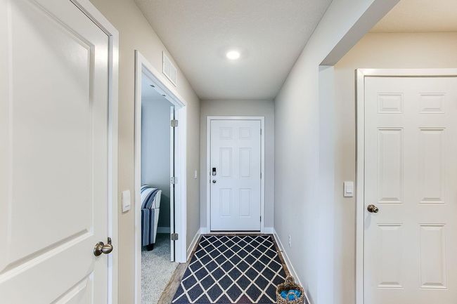 A spacious entry with a flex room separated by double doors to use a home office or play room! Photos of model home. Colors and options may vary. Ask Sales Agent for details. | Image 16