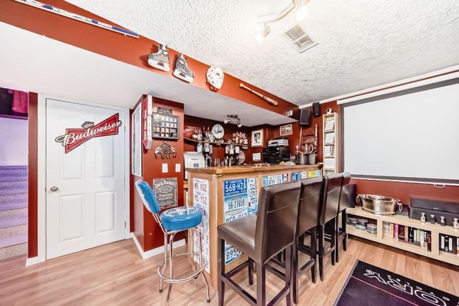 39 Bow Ridge Drive, House other with 3 bedrooms, 4 bathrooms and 2 parking in Cochrane AB | Image 32