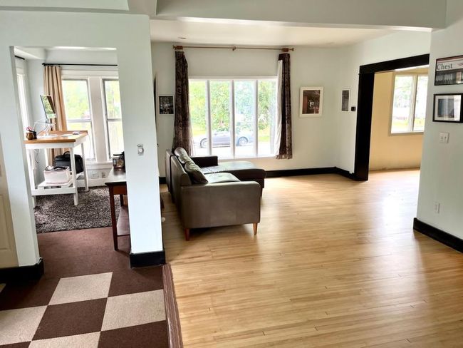 There are large windows throughout the home. | Image 4