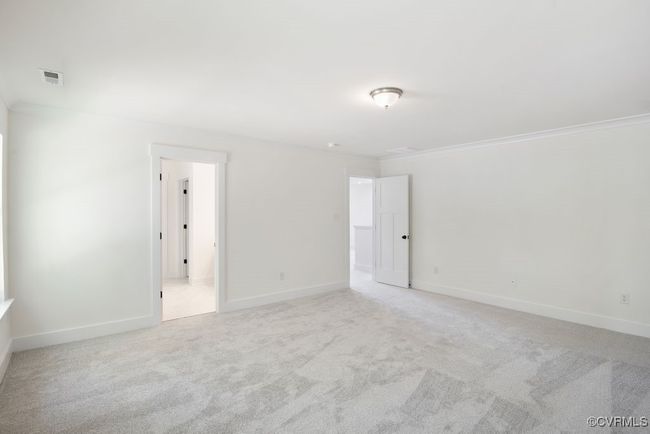 Photo represents the plan, not the actual home. Design selections may vary. On the second floor, you’ll find the primary bedroom featuring a walk-in closet and an ensuite bath with double vanity. | Image 24