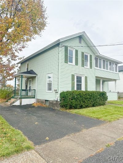 Side Entrance for upper unit with separate driveway! | Image 2