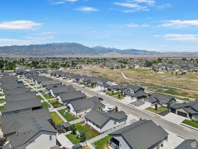 Aerial view of residential area featuring mountains | Image 35