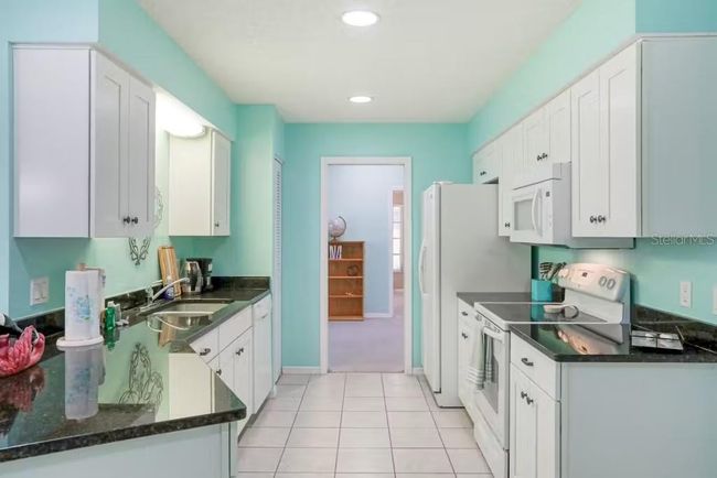 Kitchen with ample storage | Image 6