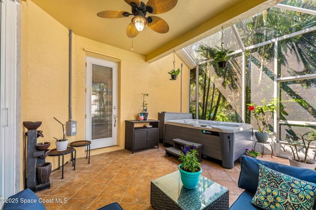 Screened in Patio with Hot Tub and covered Seating area | Image 14