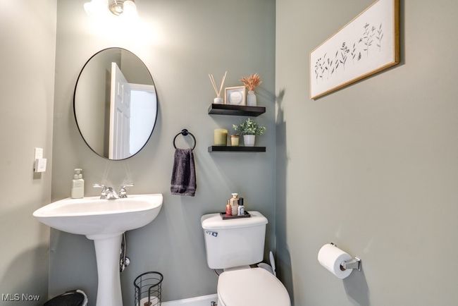 Bathroom with toilet and baseboards | Image 20