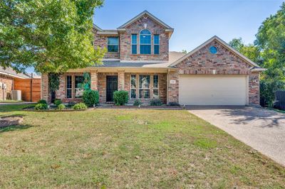 Beautiful home with a covered front porch | Image 1