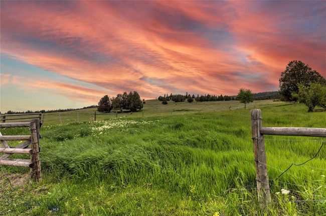 Yard at dusk with a rural view | Image 13