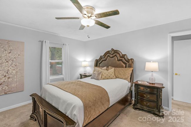 Bright and airy primary bedroom | Image 24