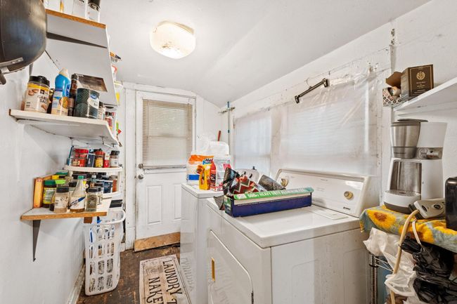 Washroom featuring washer and dryer | Image 9