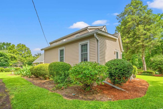 View of side of home featuring a lawn | Image 25