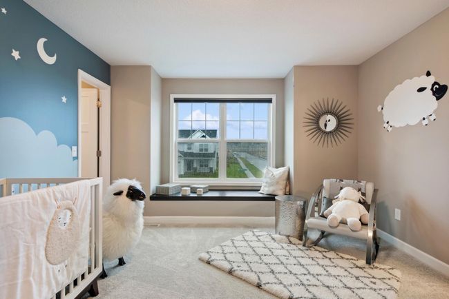 (Photo of decorated model, similar floor plan, colors, finishes and features will vary) Bedroom 4 with stylish window seat and spacious walk in closet. | Image 20