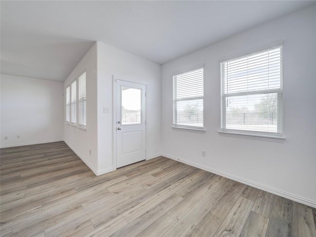 Entryway featuring light wood-type flooring and baseboards | Image 12