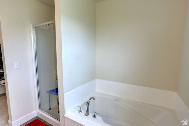 Bathroom with a garden tub and a shower stall | Image 15