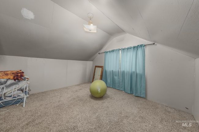 Bonus room with vaulted ceiling and carpet floors | Image 16